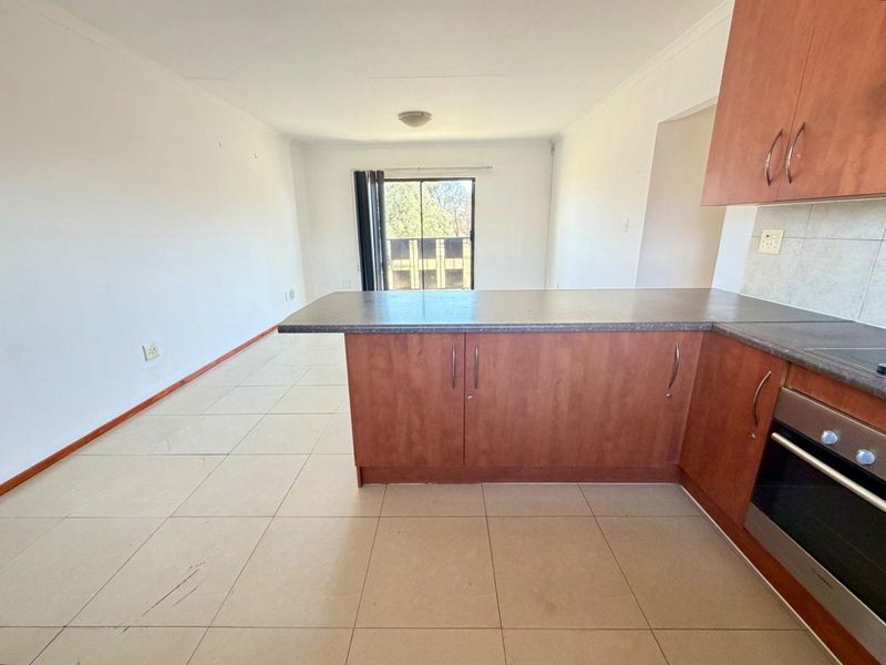 First Floor Low Maintenance Facebrick Unit in Well Managed Complex - Photo 9
