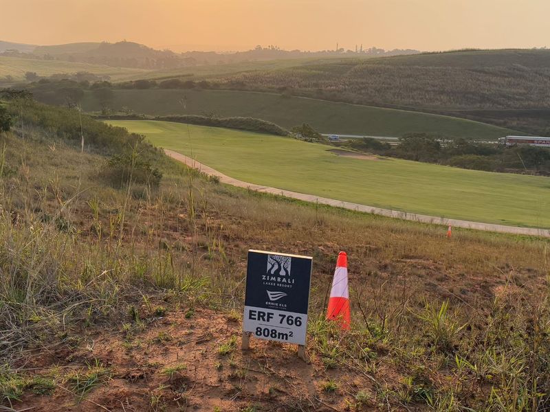 A scenic view of an 808m2 vacant residential plot overlooking a golf course at Zimbali Lakes Resort.