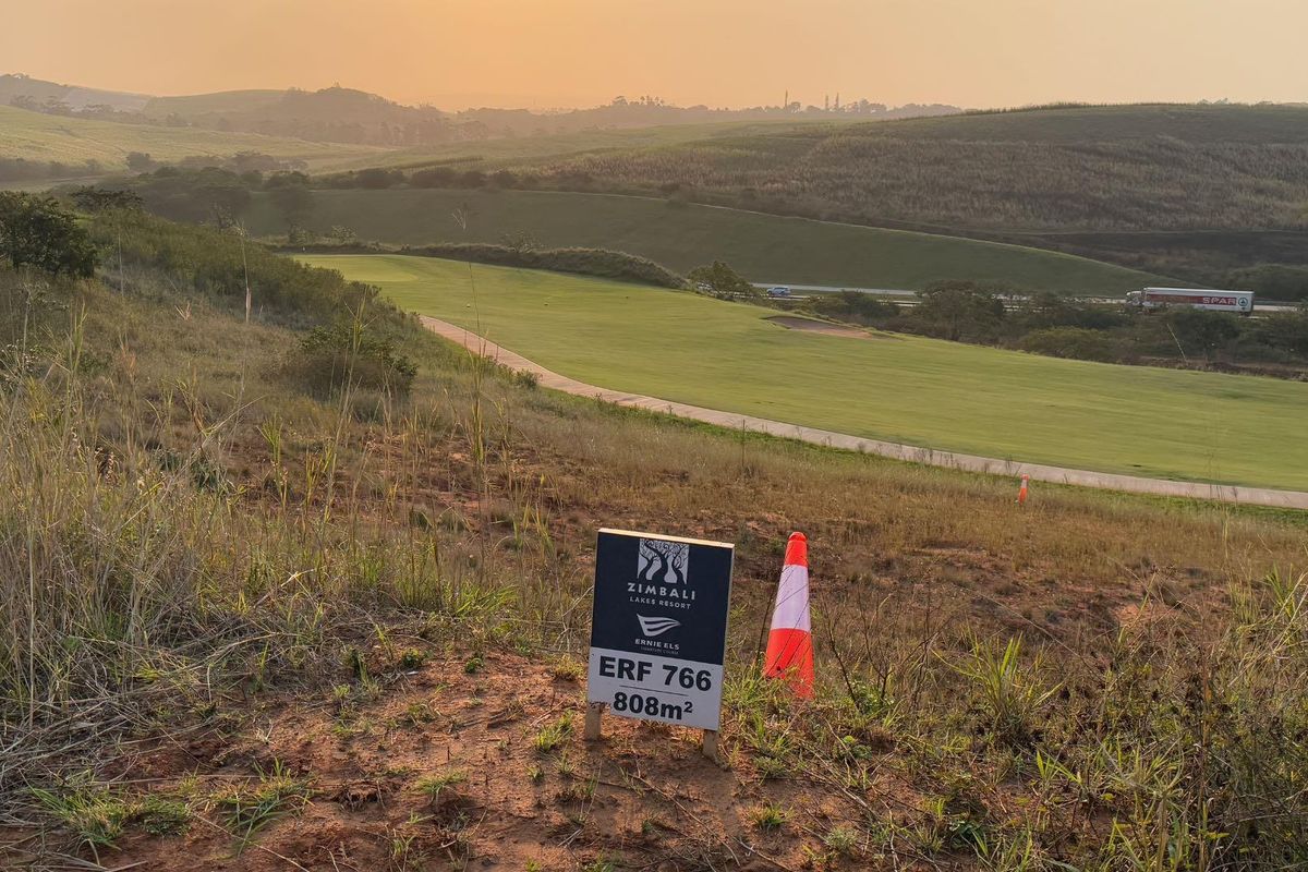 A scenic view of an 808m2 vacant residential plot overlooking a golf course at Zimbali Lakes Resort.