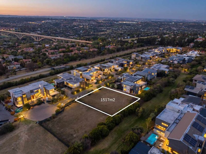 An aerial view of a 1517m2 vacant residential plot situated within an established estate, ready for development.
