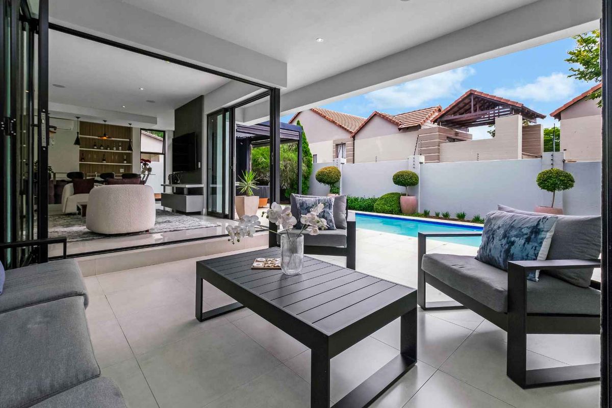 A STRIKING AND SOPHISTICATED MODERN CONTEMPORARY MASTERPIECE, IN A SOUGHT AFTER QUIET AND SERENE ESTATE - Photo 3