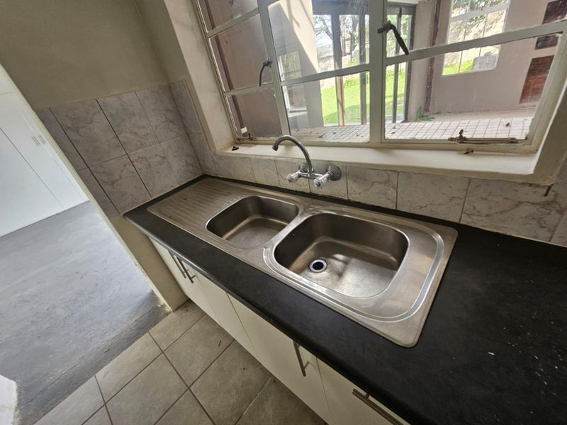 **Charming Double Storey Home in a Tranquil Setting** - Photo 9