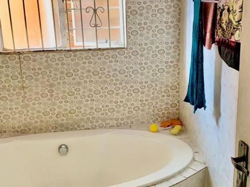 **Charming 3-Bedroom Home in Ormonde Complex**with outside room and toilet - Photo 9