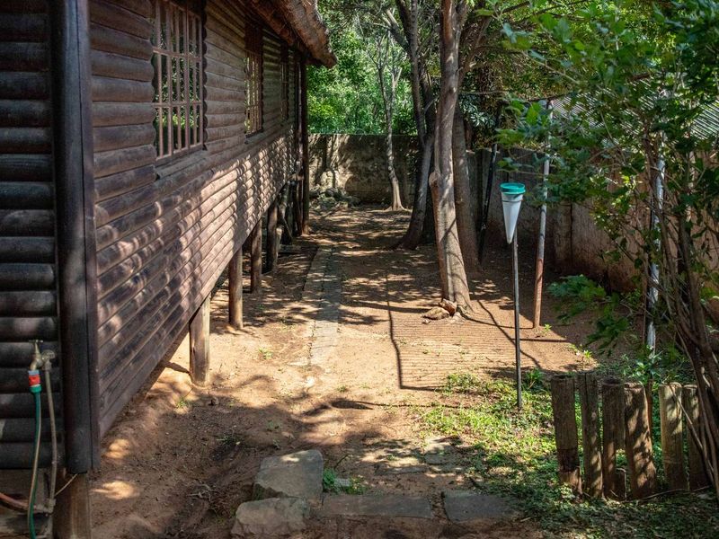 Charming Turnkey Investment – Character-Filled Thatch Roof Home - Photo 8