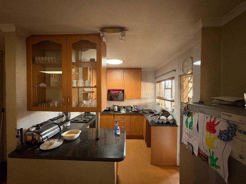 Charming and Secure Three-Bedroom House with Flatlet - Photo 3