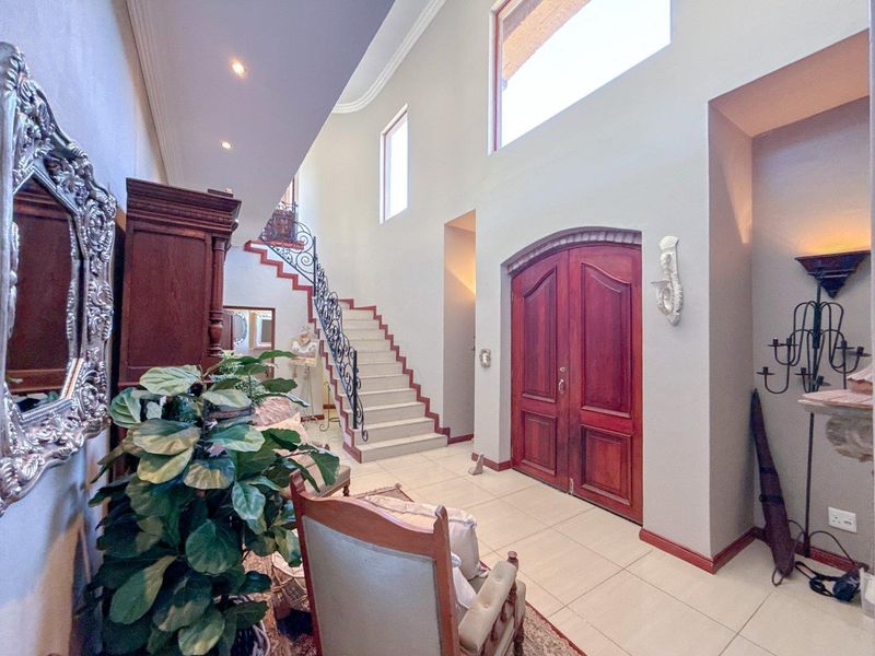 Stunning 5-Bedroom Family Home with Panoramic Views | Triple Garage | Solar | Waterkloof Golf Estate - Photo 7