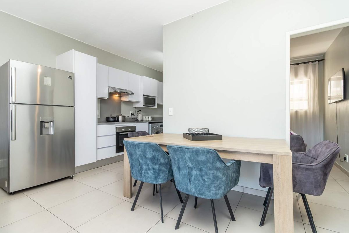 A MODERN APARTMENT AWAITS YOU - Photo 4