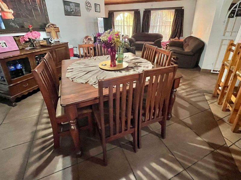 "Elegant Face Brick Home with Modern Security and Ample Parking! - Photo 5