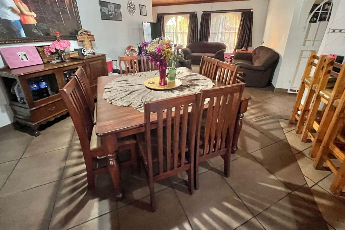 "Elegant Face Brick Home with Modern Security and Ample Parking! - Photo 5