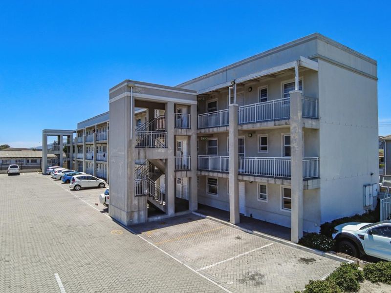 Top-Floor Gem: A Bright and Modern Investment Opportunity! - Photo 2