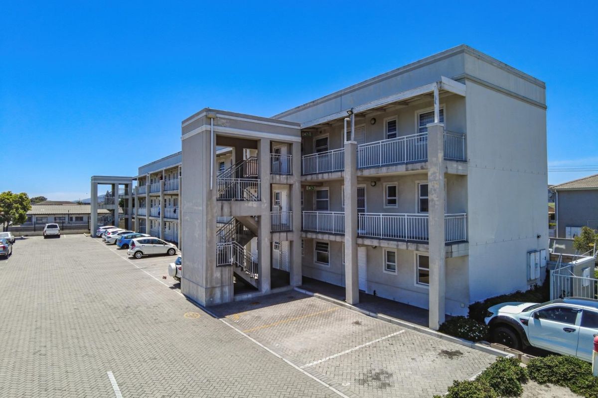 Top-Floor Gem: A Bright and Modern Investment Opportunity! - Photo 2