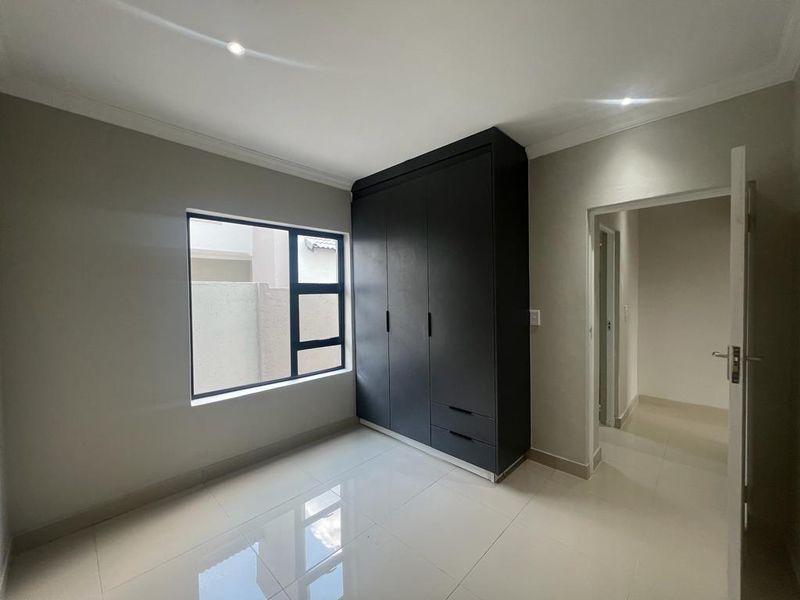 Elegant 4-Bedroom Home in Zambezi Manor Estate - Photo 10