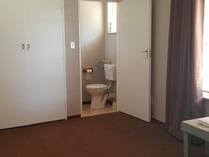 Riverfront 4-Bedroom Double Storey Home with Apartment in Barkly West - Photo 6