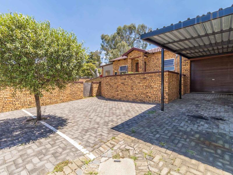Stunning Corner Stand Townhouse: Largest Garden in a well maintained pet friendly Complex! - Photo 1