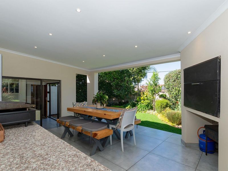 Stylish 4-Bedroom off-grid Family Home in Secure Van Riebeeck Park Enclosure - Photo 10