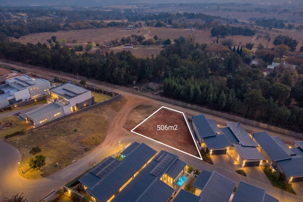 An aerial view of a 506m2 vacant residential plot situated within a developed estate, highlighting the available building footprint.