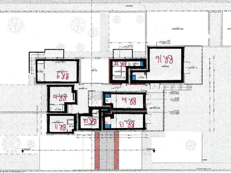 Architectural floor plan layout showing the configuration of multiple bedrooms and en-suite bathrooms within the guest house property.