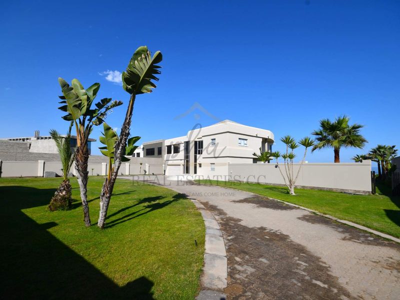 Exceptional Double-Story Beachfront Home with Unobstructed Sea Views - Photo 2