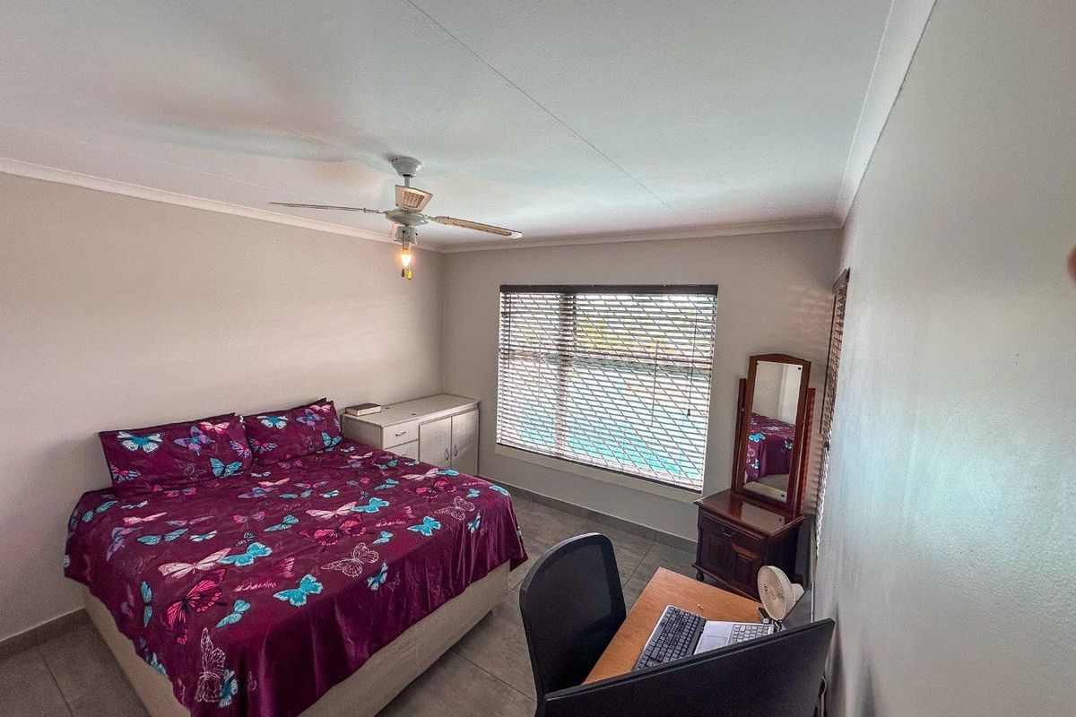 Modern 2-Bedroom Townhouse with Patio and Private Courtyard in Rangeview in Cosmos Complex - Photo 4