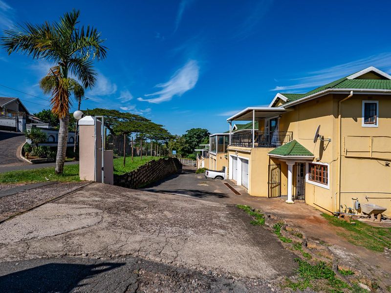 Spacious Hillside Townhouse with Scenic Views & Great Potential - Photo 3