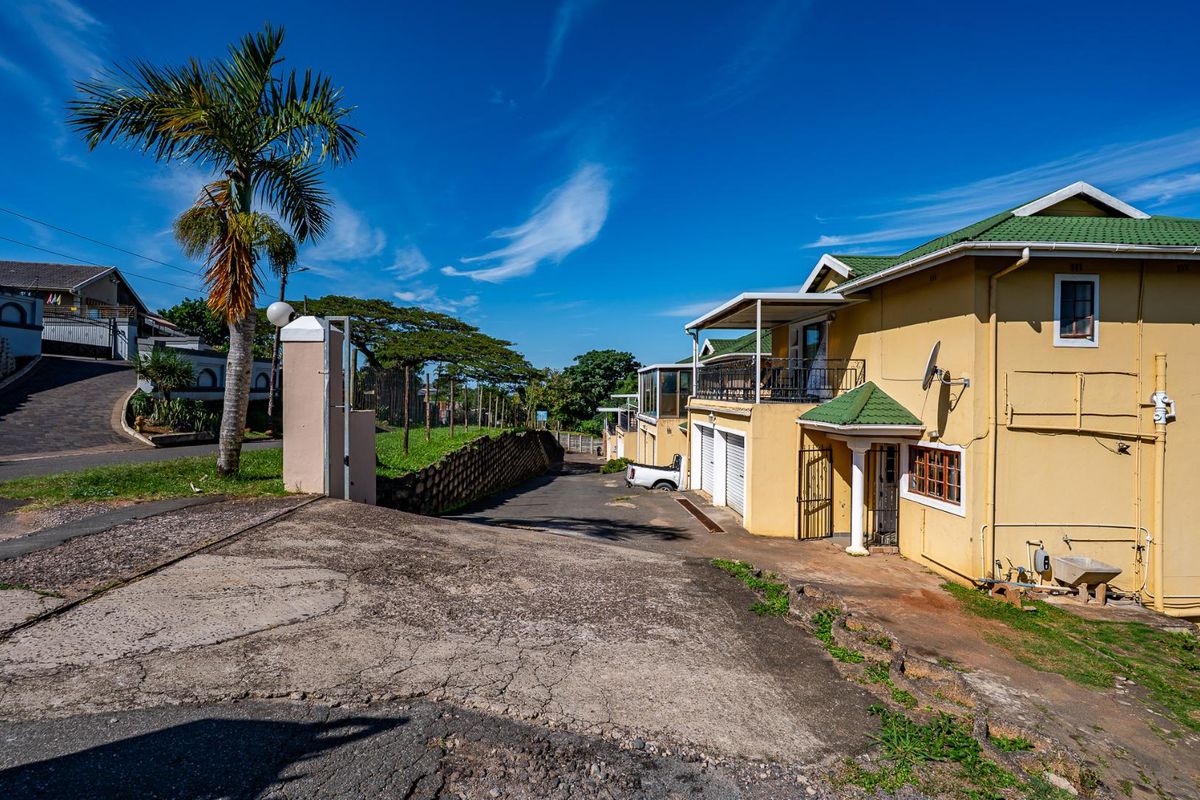 Spacious Hillside Townhouse with Scenic Views & Great Potential - Photo 3