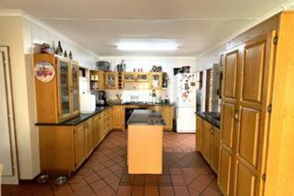 Open Plan Kitchen with separate scullery/laundry
