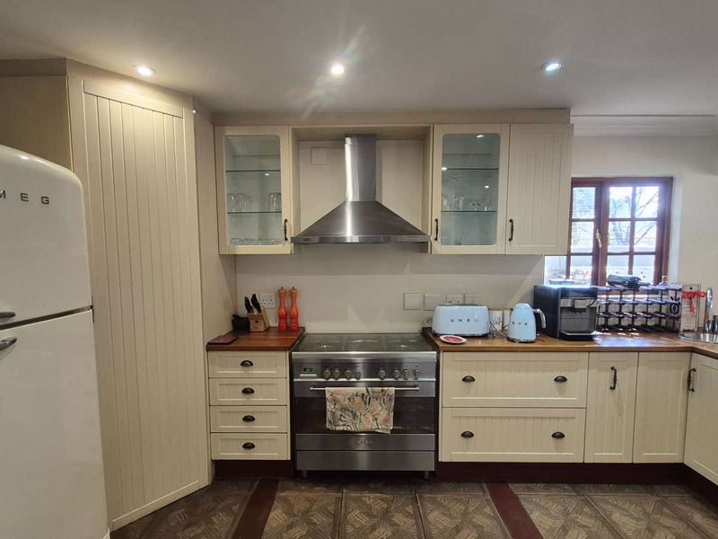 A Country-Style Family Haven with Separate Cottage in the Heart of Douglasdale - Photo 2