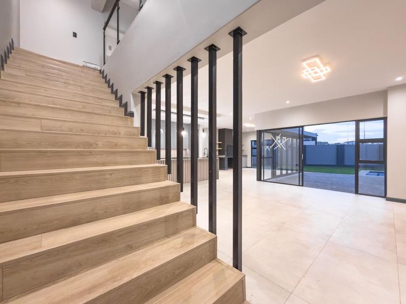 Overview  This modern double-storey home offers the perfect combination of style, privacy, and functional family living.  Designed with comfort - Photo 7