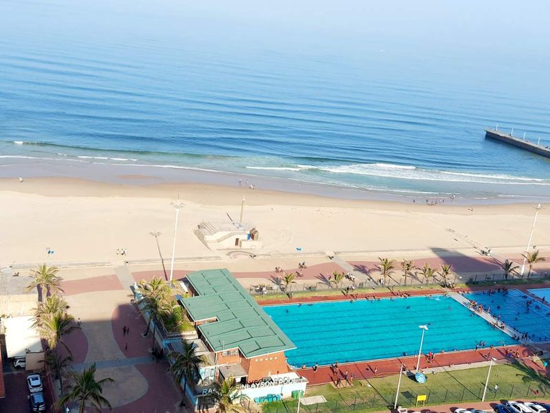 Beachfront Bliss: Modern Apartment with Uninterrupted Ocean Views - Photo 1