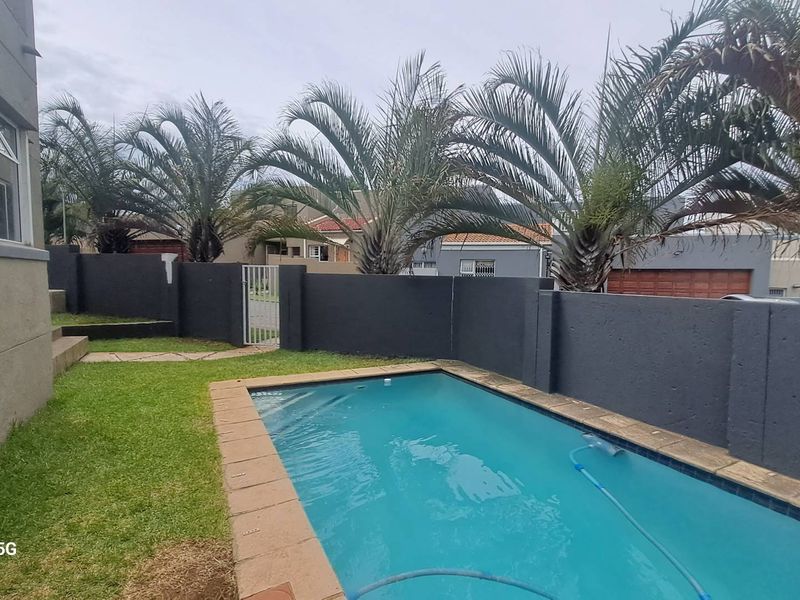 Well located 3 Bedroom Duplex with it's own pool - Photo 2