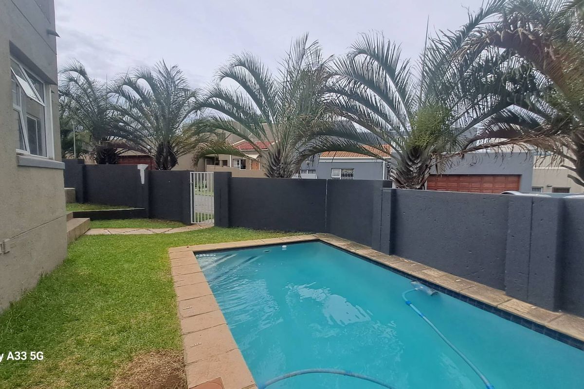 Well located 3 Bedroom Duplex with it's own pool - Photo 2