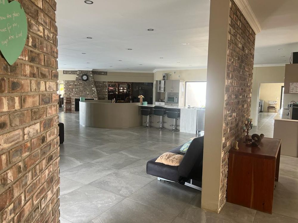 View of open-plan kitchen from bedroom
