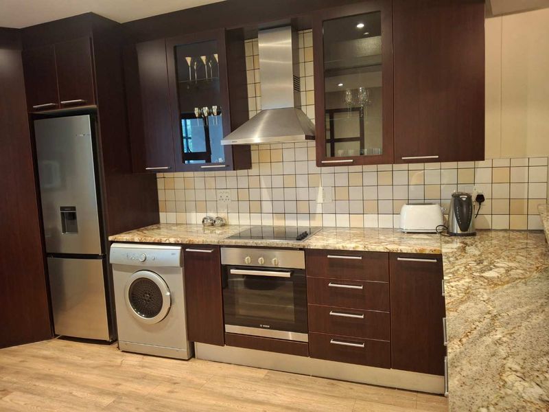 A TASTEFULLY FURNISHED TWO BEDROOM APARTMENT - Photo 6