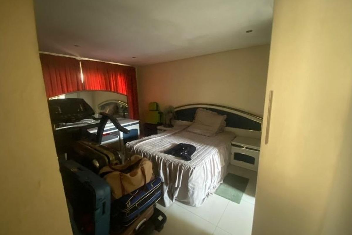 Complete This 2-Bed Home & Profit from 6-Room Rentals Now! - Photo 5