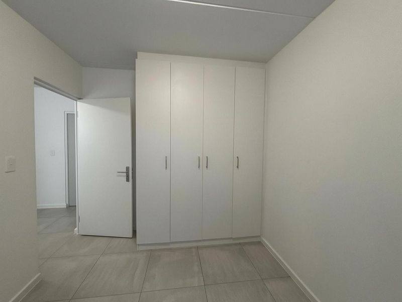 Investment Opportunity | Stylish 2-Bedroom Apartment in Rivergate – Tenanted & Income Generating - Photo 9