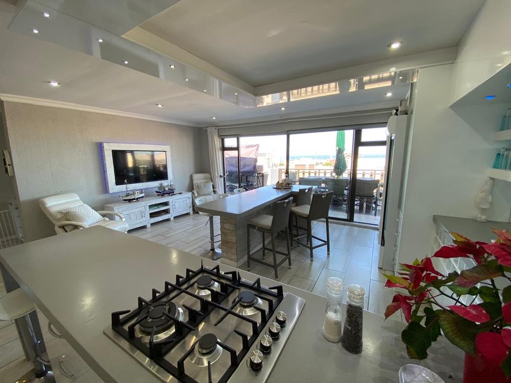 First floor open-plan lounge, kitchen and lounge with balcony