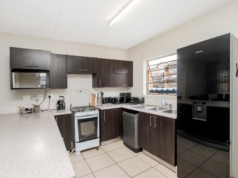 Neat 2 bedroom 2 bathroom unit for sale in Honey Park Roodepoort - Photo 5
