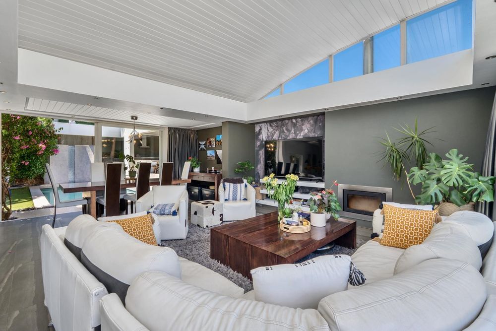 Living space leads onto two outdoor areas