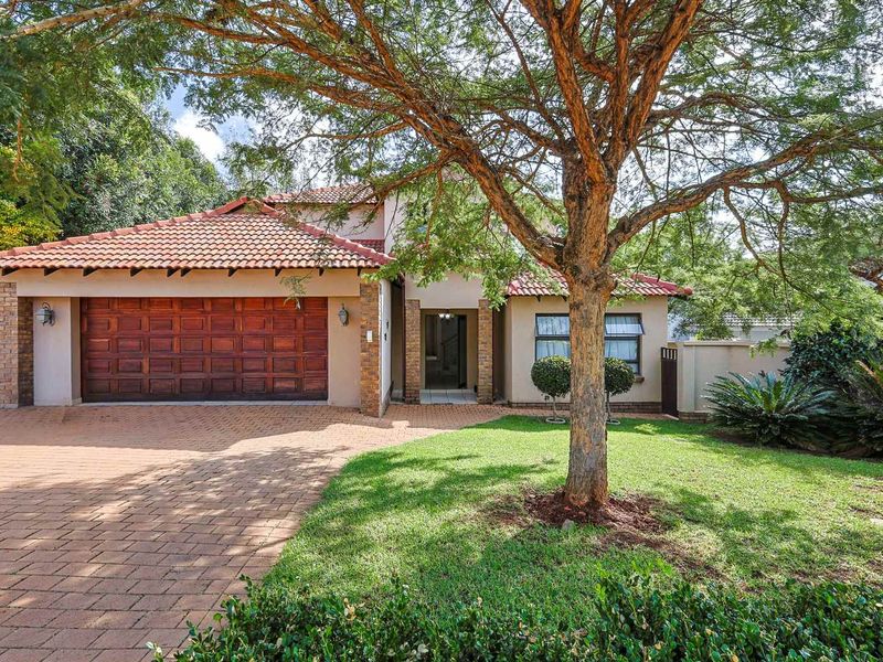 Elegant 4-Bedroom Family Home in Secure Heron Hill Garden Estate - Photo 9