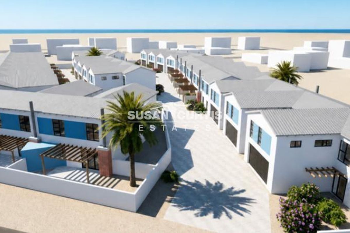 An aerial 3D render of a townhouse complex featuring multiple units with pitched roofs, private pergolas, and paved driveways.