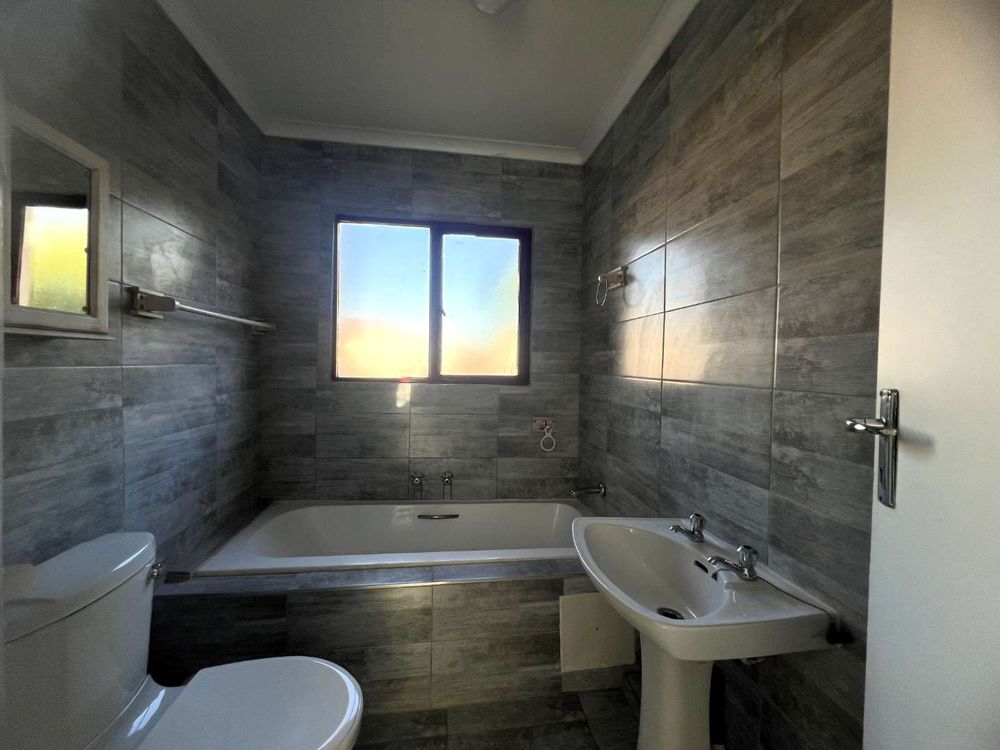 Newly retiled family bathroom 
