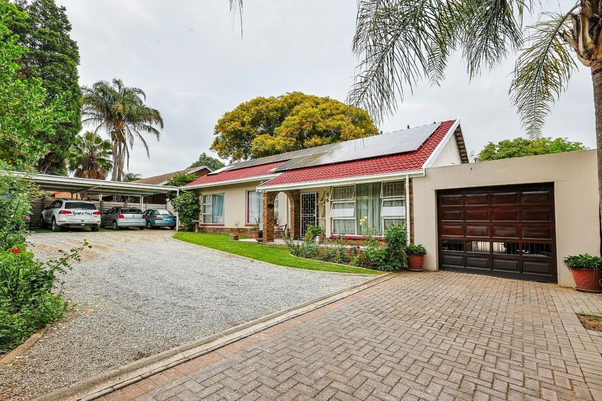 Family Home with Flatlet, Solar Power, and Pool in Sought-After Rooihuiskraal - Photo 2