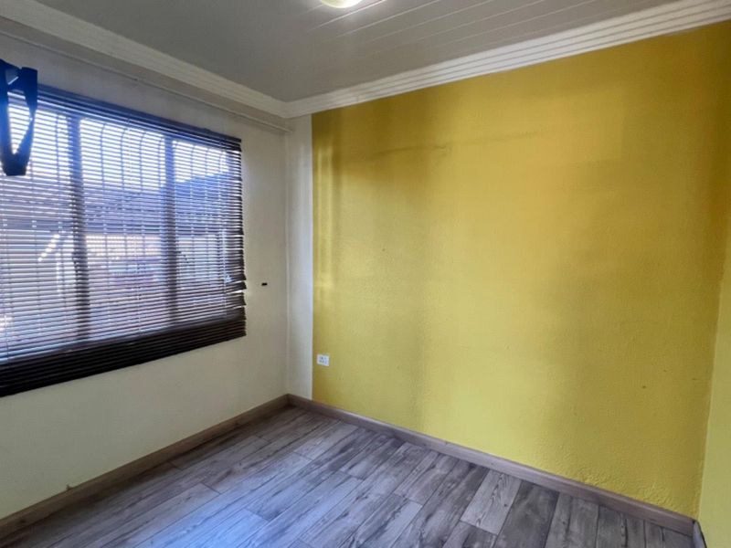 Cook, Relax, and Feel Safe in This Stunning 2-Bedroom Home - Photo 8
