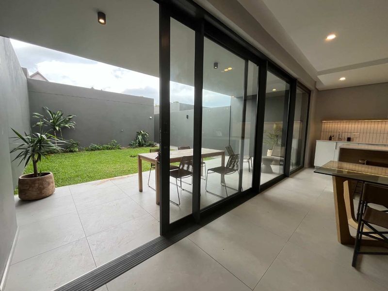 Experience luxury coastal living in this modern 3-bedroom duplex villa at the prestigious Zimbali - Photo 2