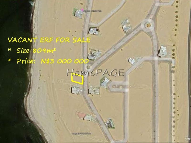 Aerial view of a vacant residential erf located in a coastal development, highlighting the plot location and surrounding street layout.