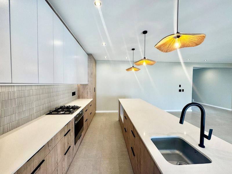 Welcome to a brand-new masterpiece in the highly sought-after suburb of Sandown – where luxury, comfort, and contemporary elegance come together effortlessly. V - Photo 3