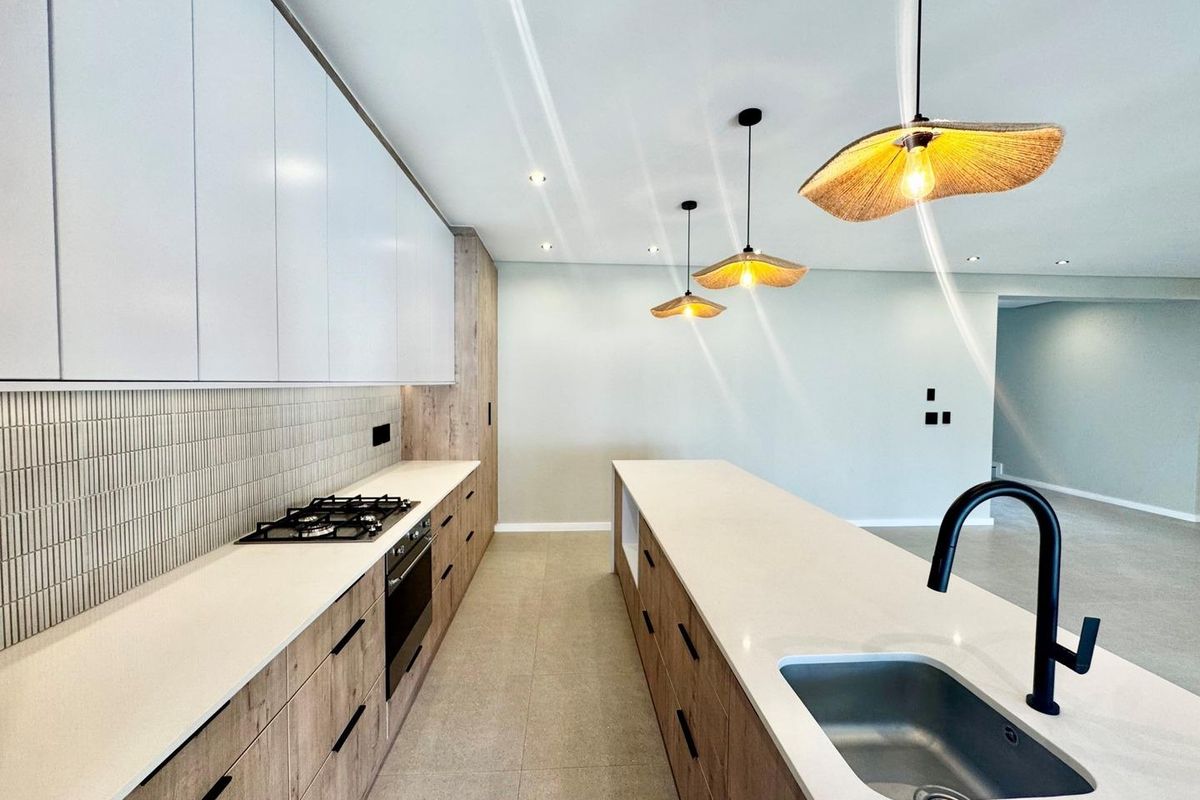 Welcome to a brand-new masterpiece in the highly sought-after suburb of Sandown – where luxury, comfort, and contemporary elegance come together effortlessly. V - Photo 3