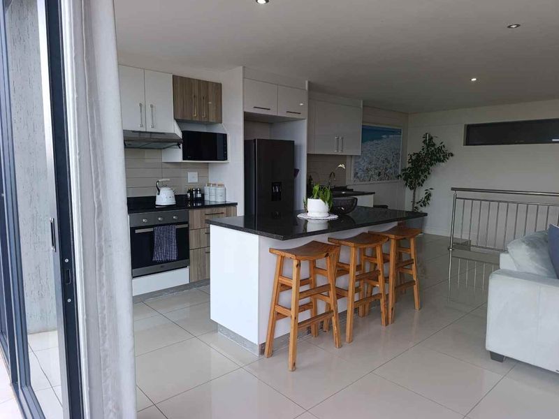 BEACHFRONT BLISS | FULLY FURNISHED 2-BEDROOM APARTMENT FOR RENT - Photo 7