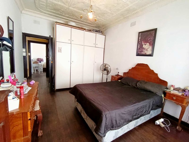 Neat 3-Bedroom Home with Income-Generating Cottage - Photo 10