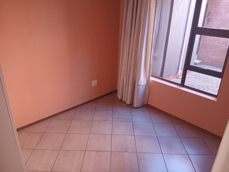 Modern Comfort Awaits in Secure Ground Floor Unit! - Photo 9